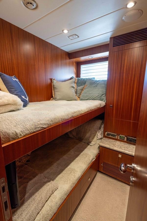 a bed in a room aboard E84 Yacht for Sale