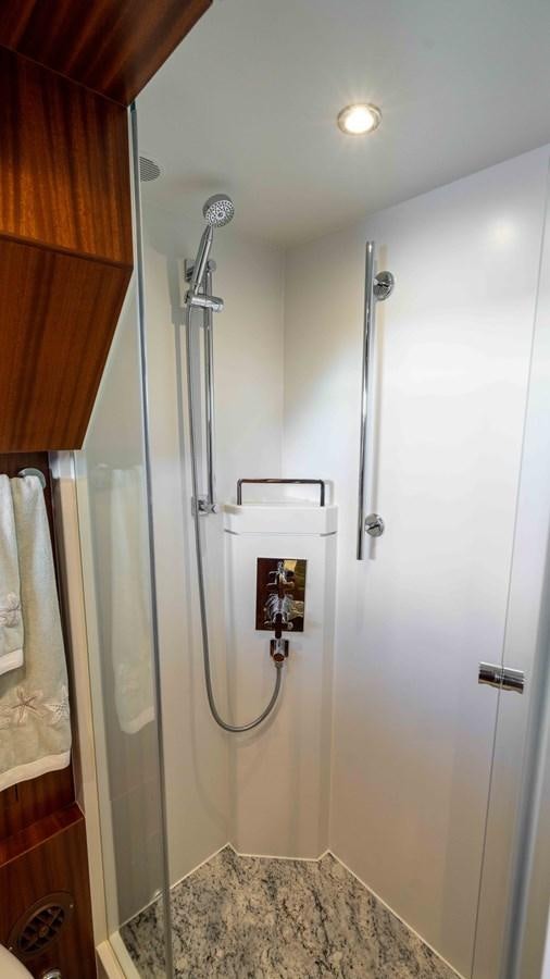 a shower unit in a bathroom aboard E84 Yacht for Sale