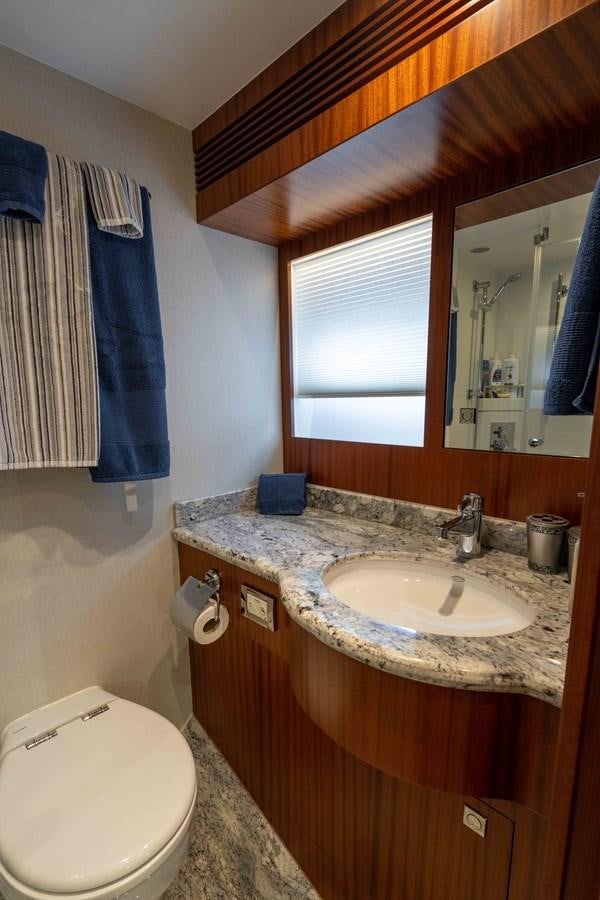 a bathroom with a sink and a toilet aboard E84 Yacht for Sale