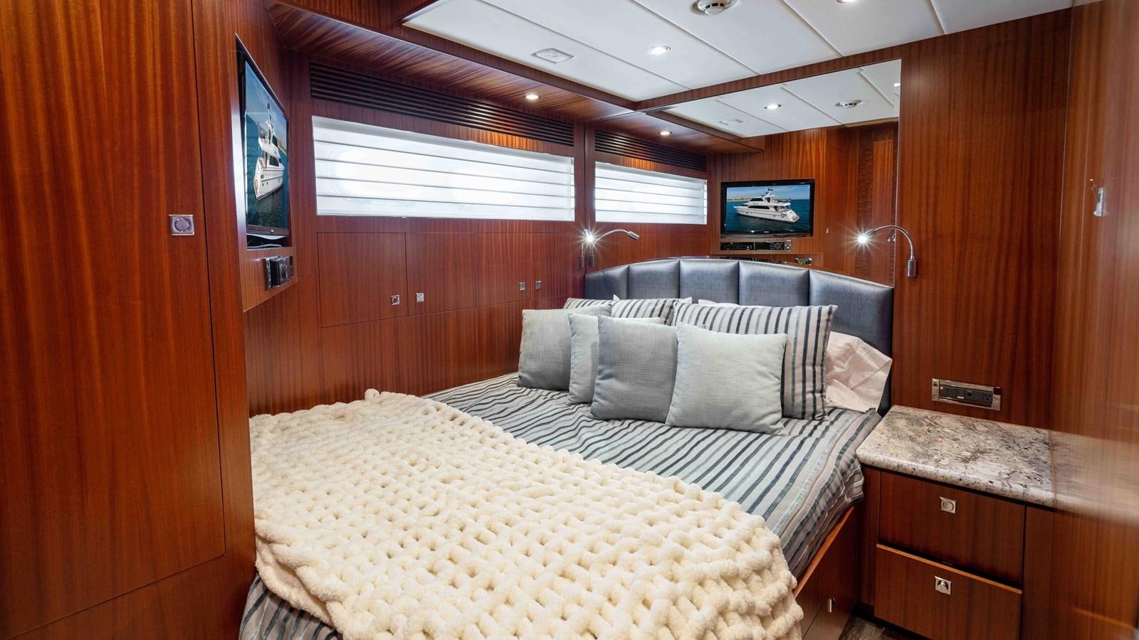 a bed in a cabin aboard E84 Yacht for Sale