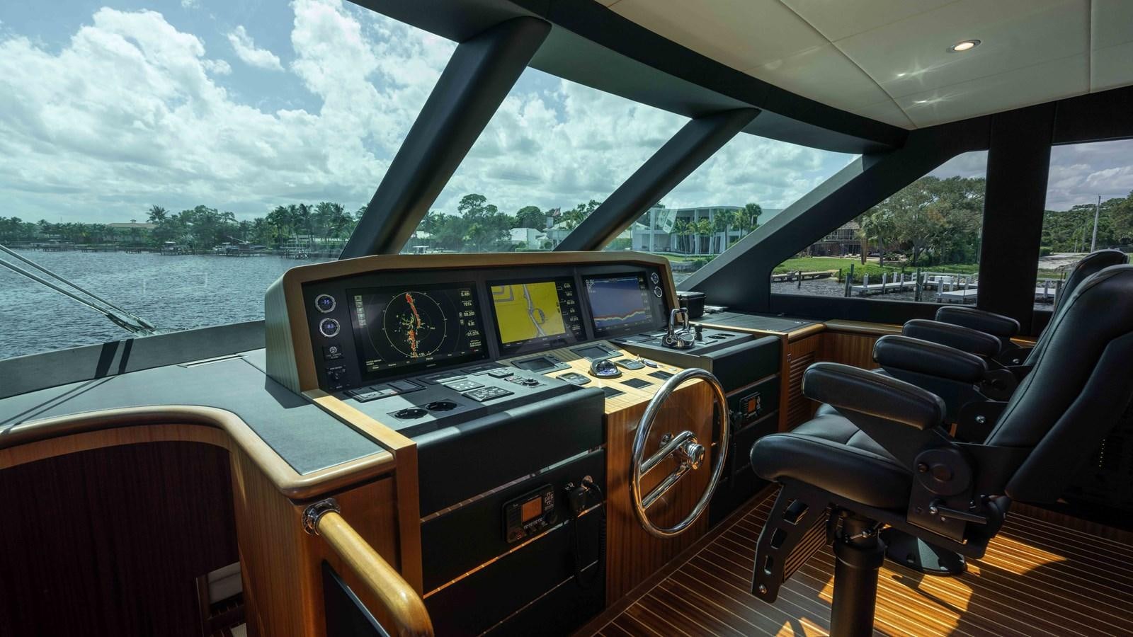 inside of a car aboard E84 Yacht for Sale