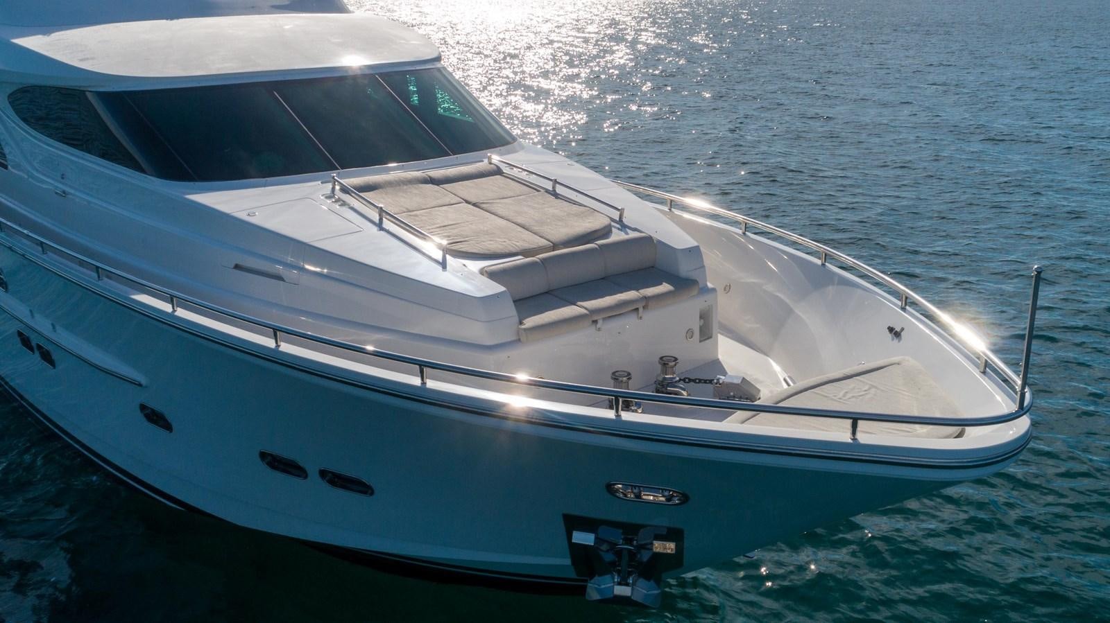 a white yacht in the water aboard E84 Yacht for Sale