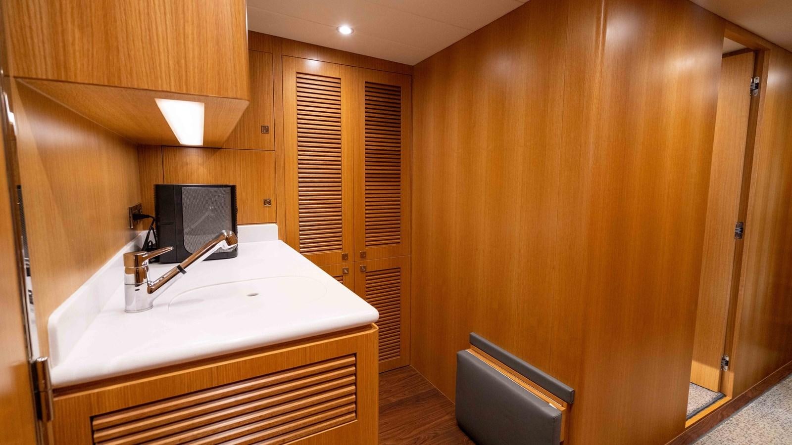 a kitchen with a large counter aboard E84 Yacht for Sale