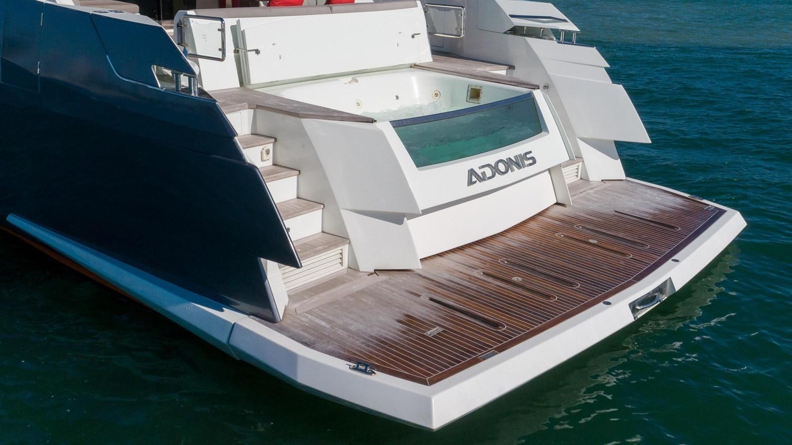 a couple of boats on the water aboard ADONIS Yacht for Sale
