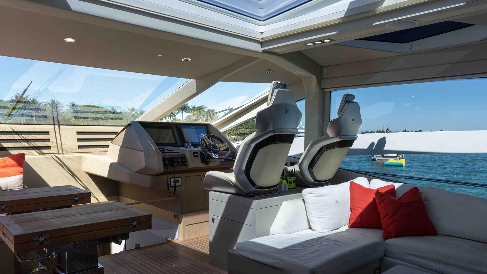 inside of a car aboard ADONIS Yacht for Sale