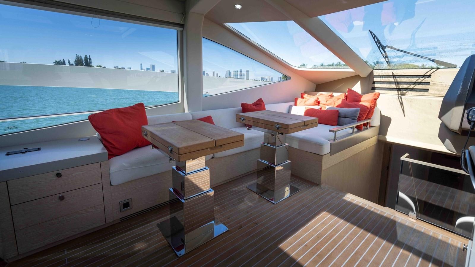 a room with a bed and a desk aboard ADONIS Yacht for Sale