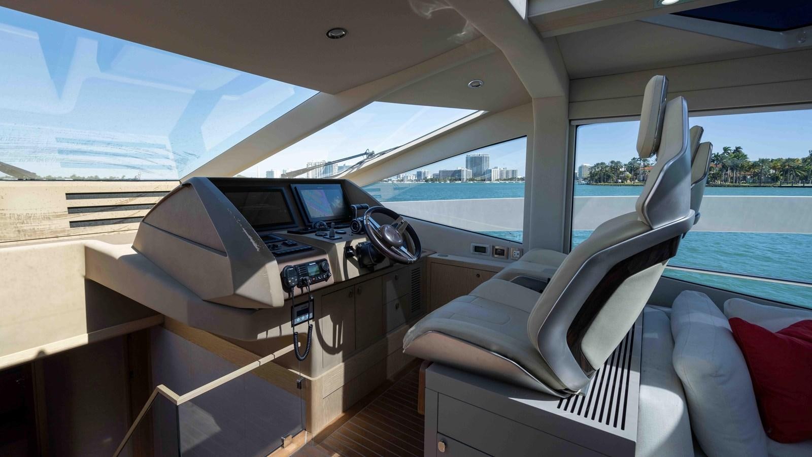 inside of a car aboard ADONIS Yacht for Sale
