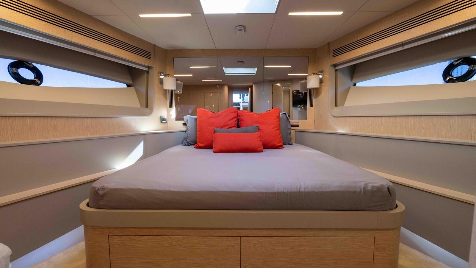 a bed in a room aboard ADONIS Yacht for Sale