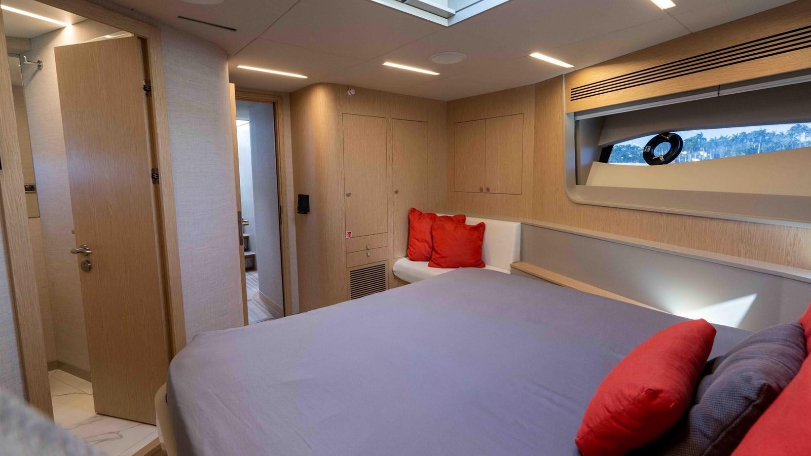 a bed in a room aboard ADONIS Yacht for Sale