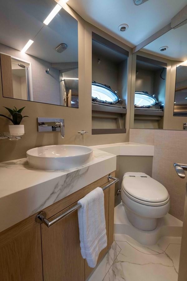 a bathroom with a sink and toilet aboard ADONIS Yacht for Sale