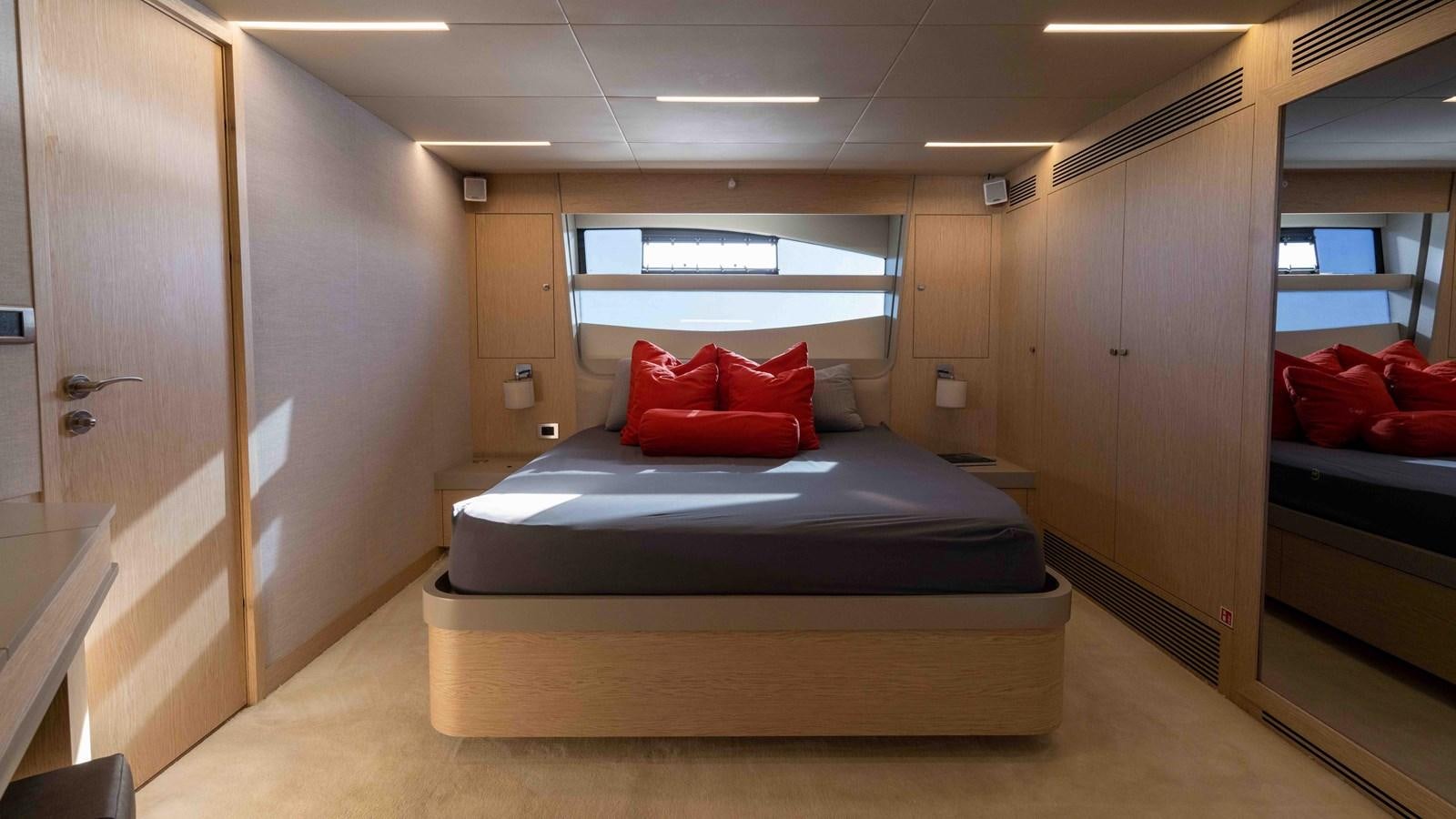 a bed in a room aboard ADONIS Yacht for Sale
