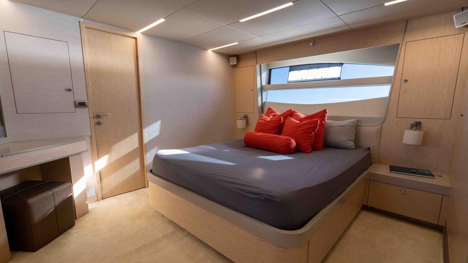 a bed in a room aboard ADONIS Yacht for Sale