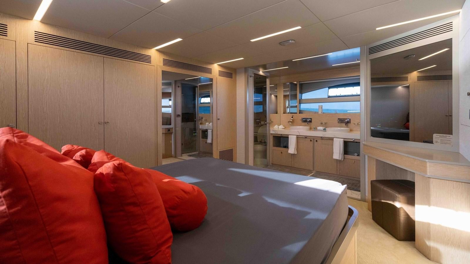 a room with a couch and a table aboard ADONIS Yacht for Sale