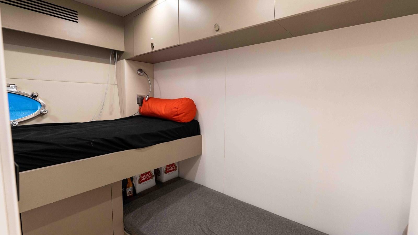 a bed in a room aboard ADONIS Yacht for Sale