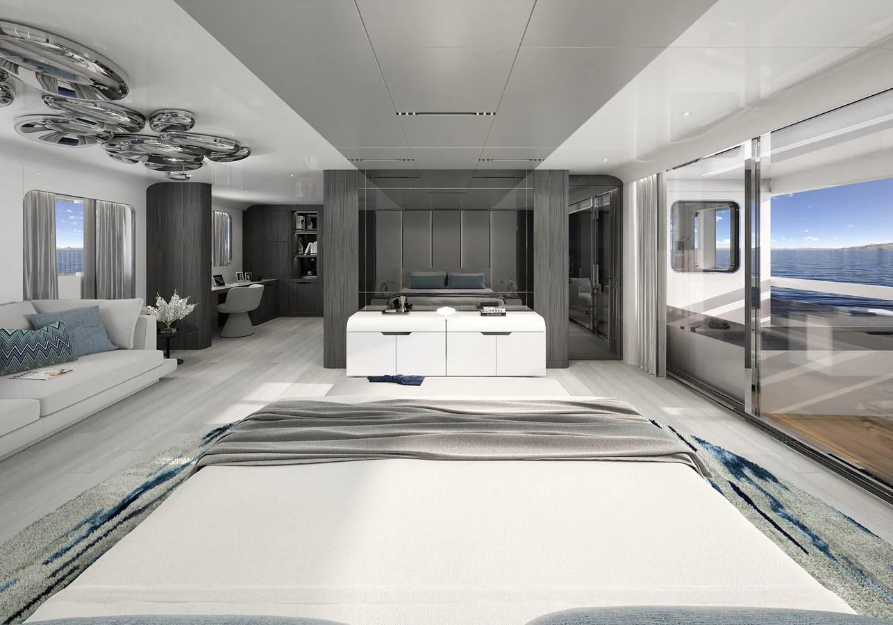 a room with a large bed and a large window aboard LEGASEA Yacht for Sale
