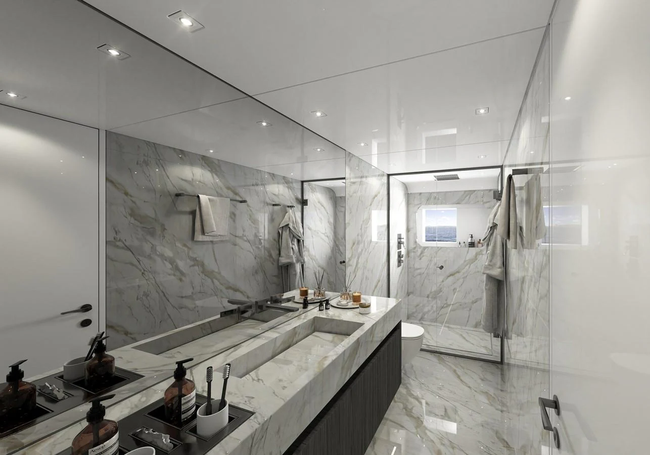 a bathroom with a large mirror aboard LEGASEA Yacht for Sale