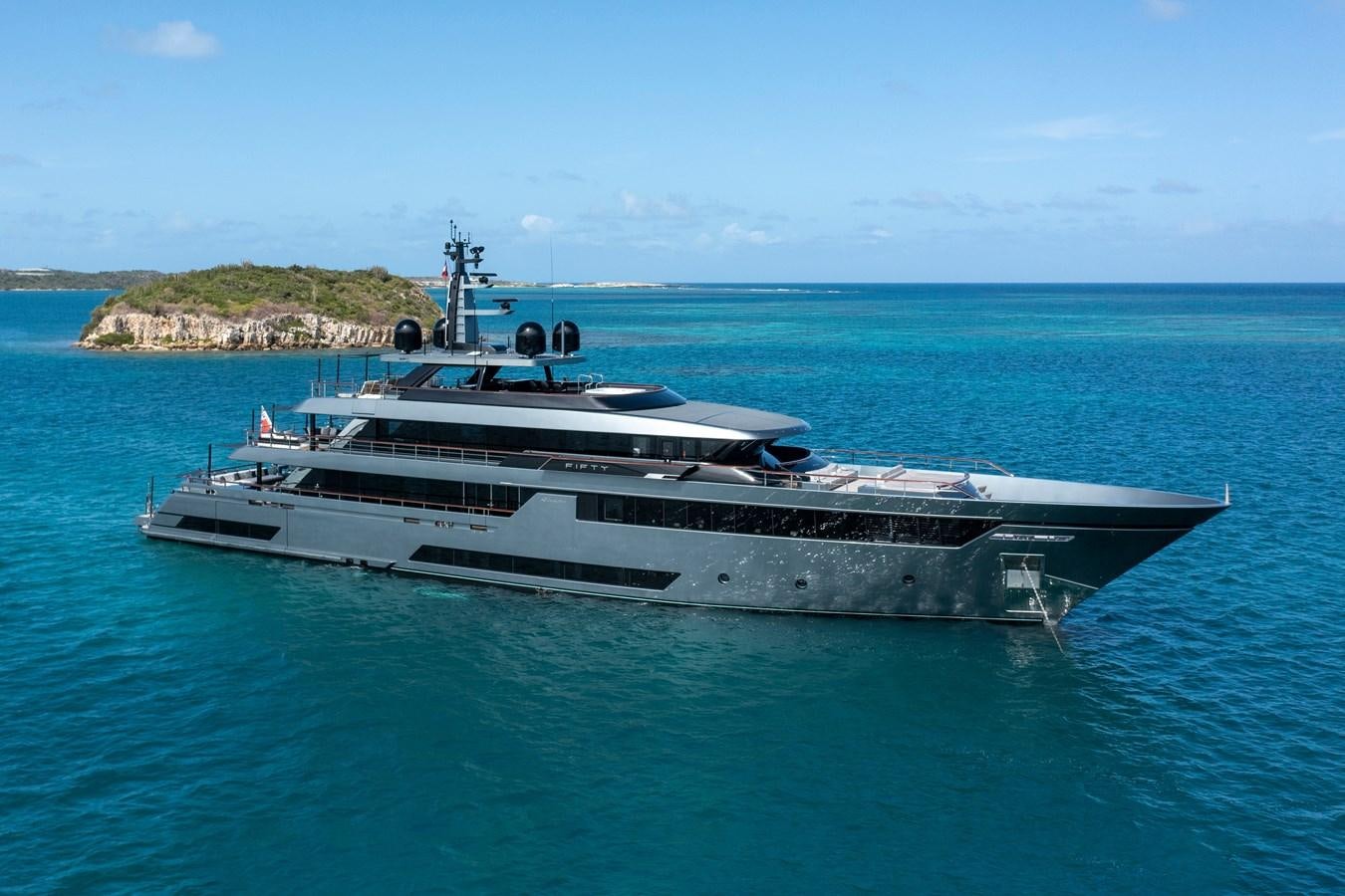 a large ship in the water aboard FIFTY Yacht for Sale