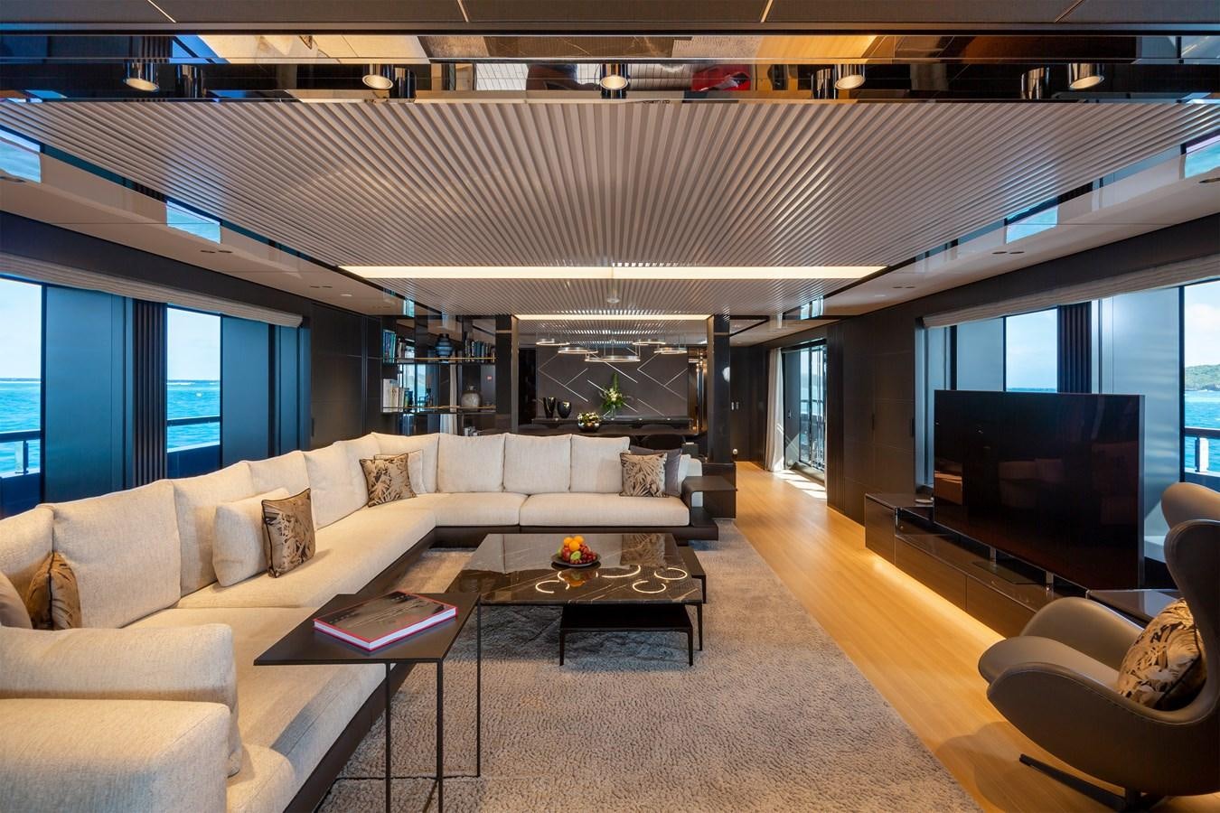 a living room with a large window aboard FIFTY Yacht for Sale