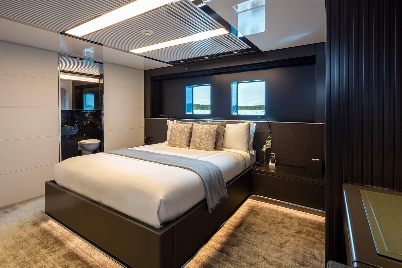 a bed in a room aboard FIFTY Yacht for Sale