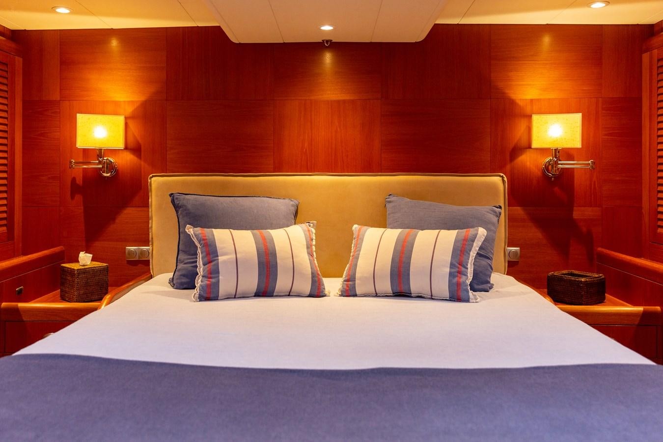 a bed with pillows and pillows aboard NAZCA 2 Yacht for Sale