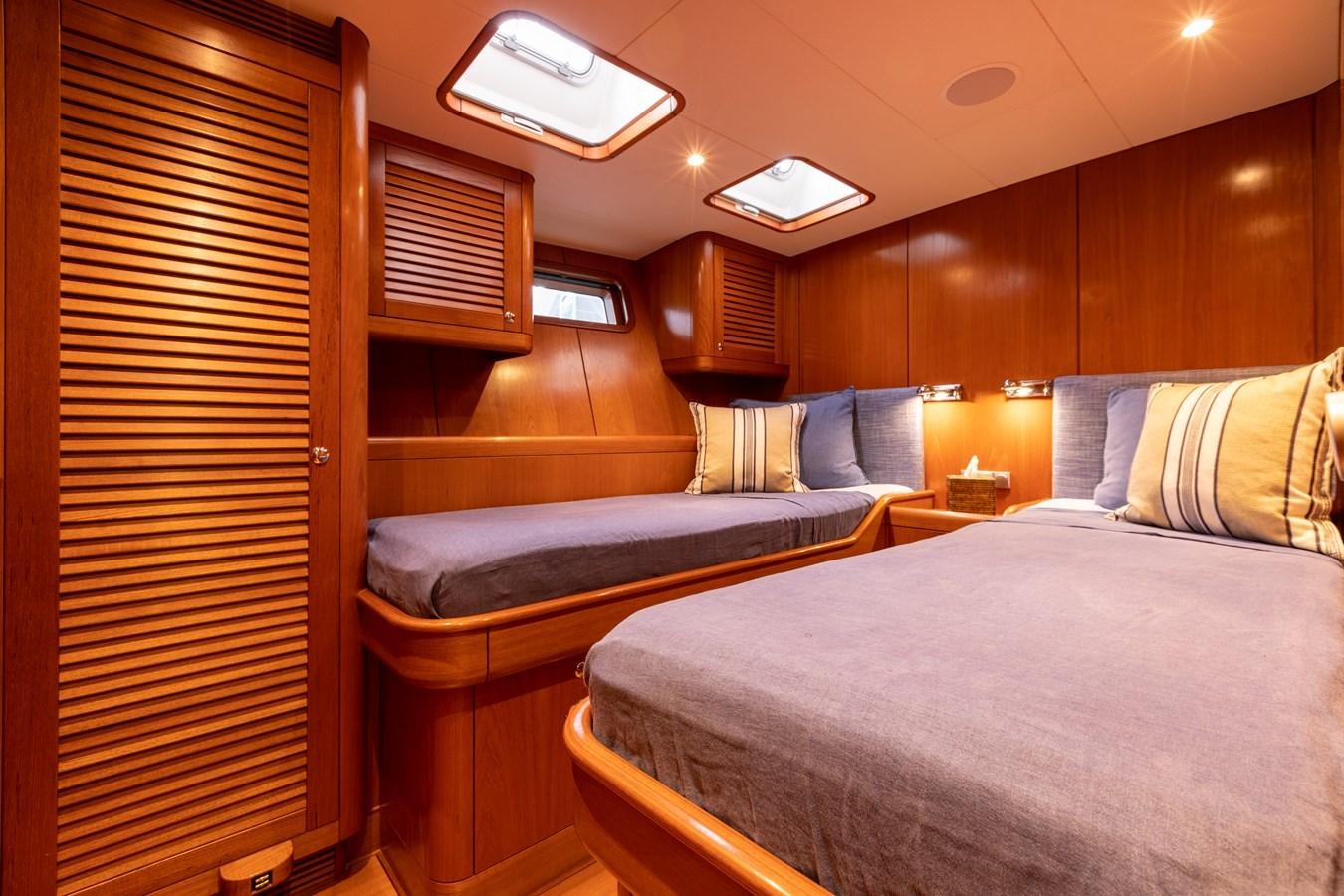 a room with two beds aboard NAZCA 2 Yacht for Sale