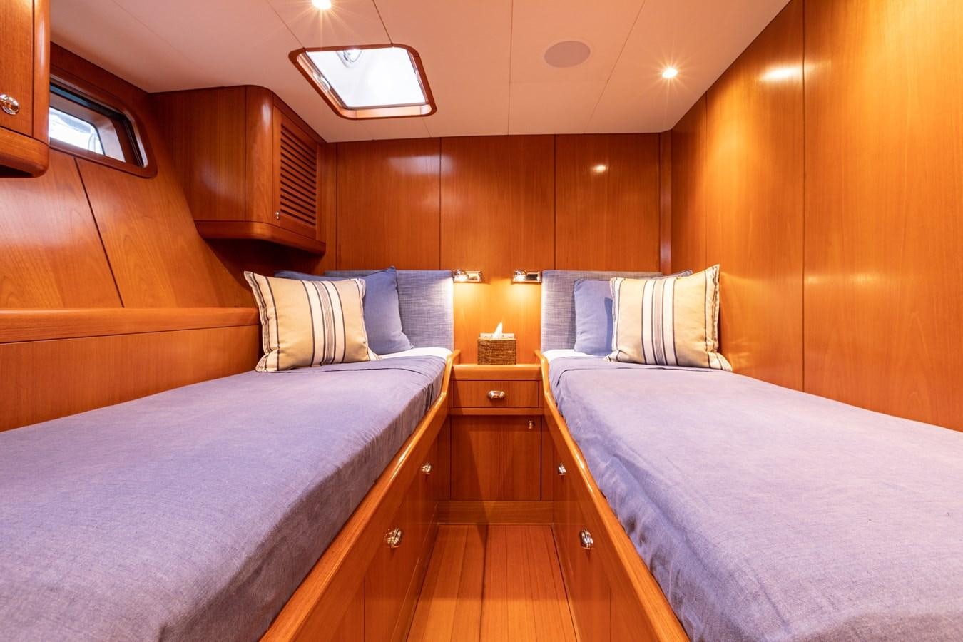 a couple of beds in a room aboard NAZCA 2 Yacht for Sale