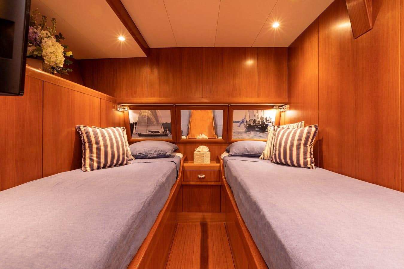 a room with two beds aboard NAZCA 2 Yacht for Sale