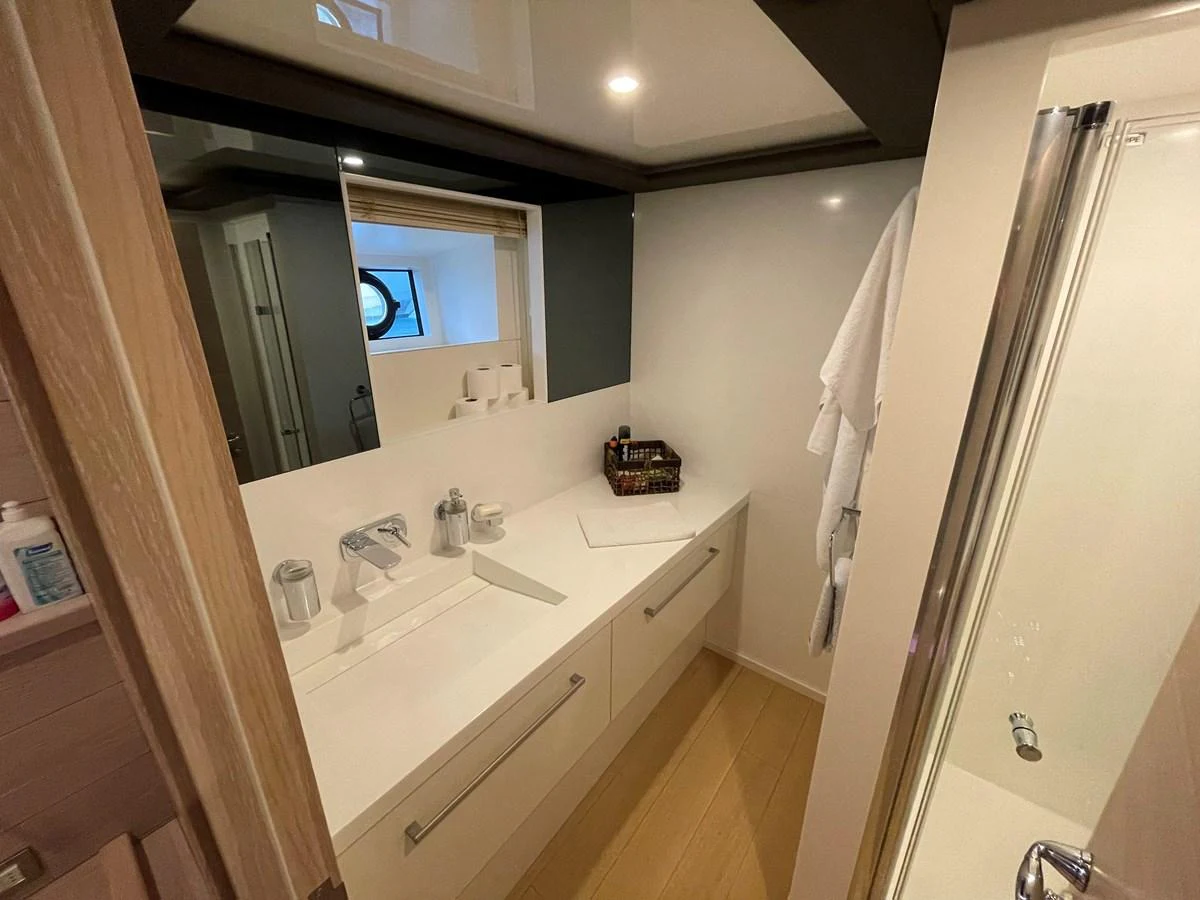 a bathroom with a large mirror aboard PENNON Yacht for Sale