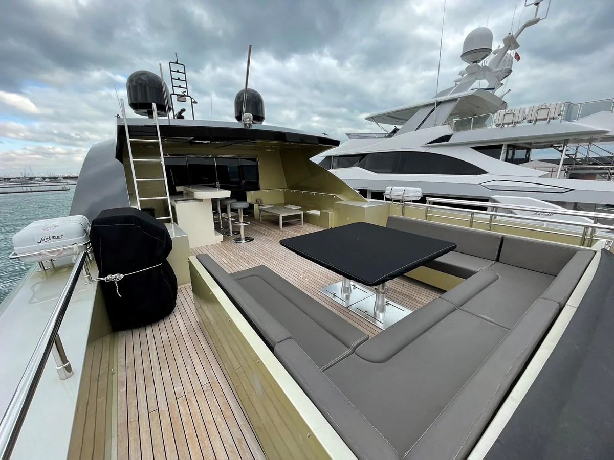 a deck with a deck and a boat on it aboard PENNON Yacht for Sale