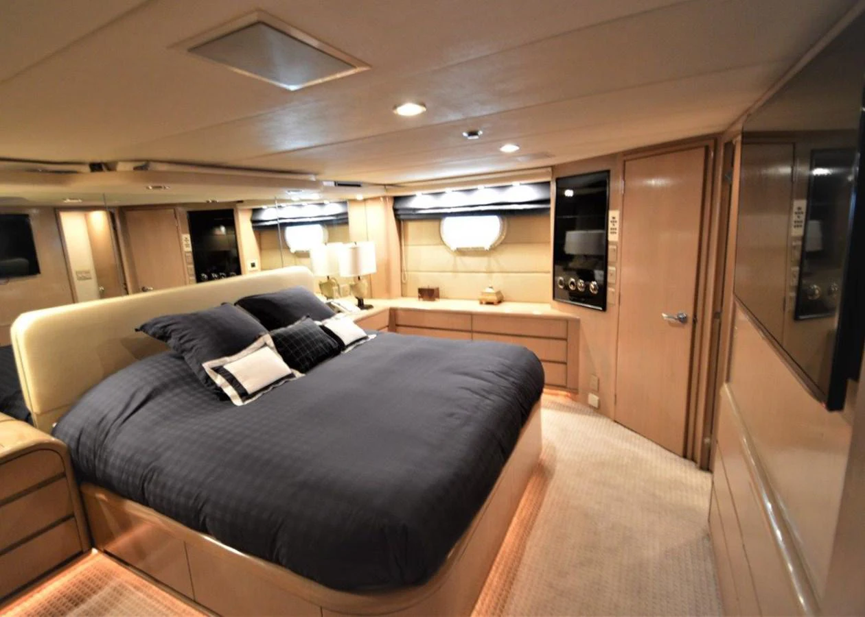 a large bedroom with a bed aboard SEAQUEST Yacht for Sale