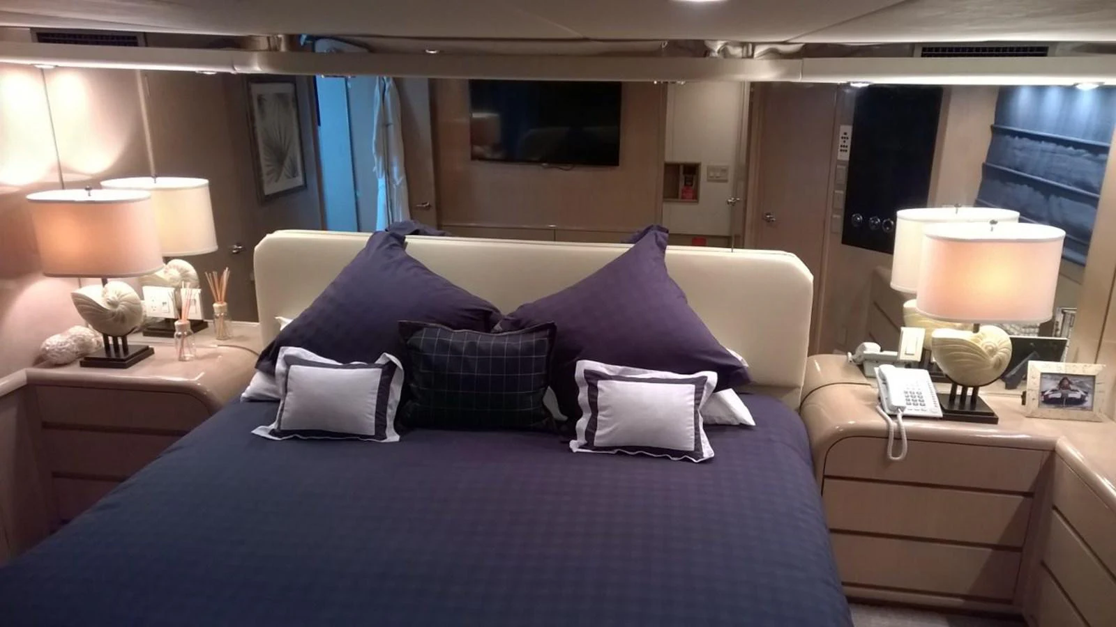 a bed with pillows and pillows aboard SEAQUEST Yacht for Sale