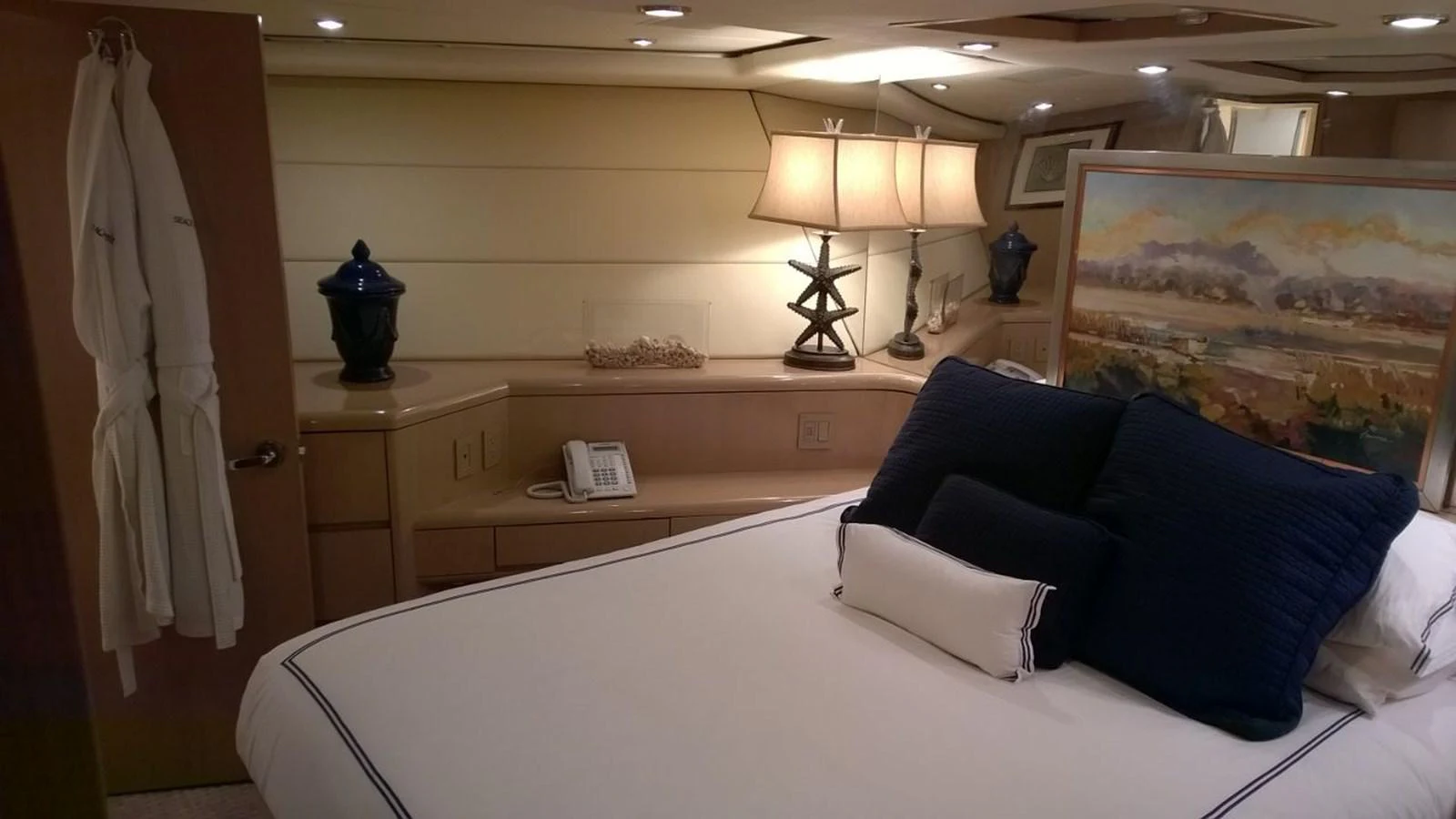 a bedroom with a large bed aboard SEAQUEST Yacht for Sale