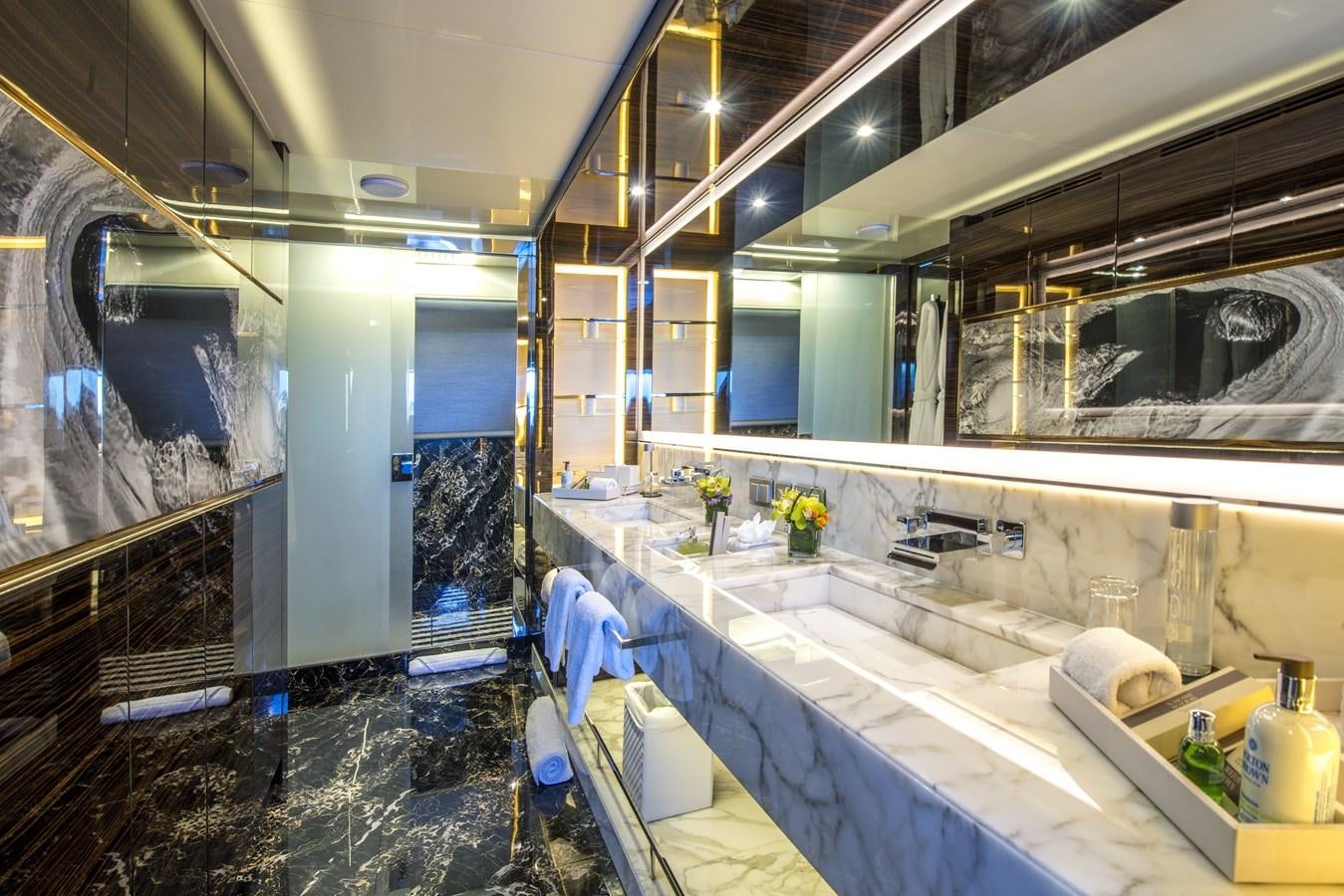a bathroom with a large countertop aboard AXIOS Yacht for Sale