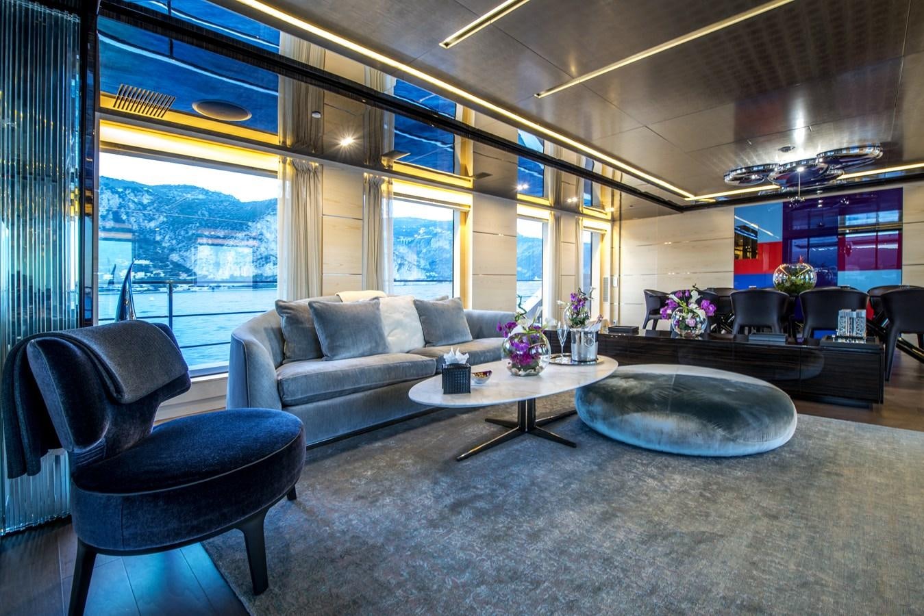 a living room with a large window aboard AXIOS Yacht for Sale