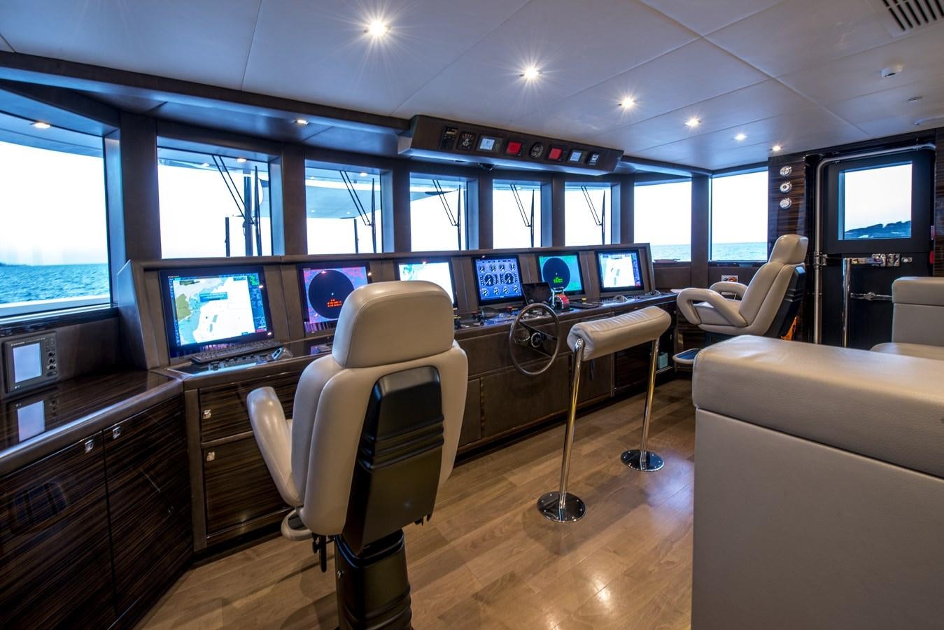 a room with a desk and a computer aboard AXIOS Yacht for Sale