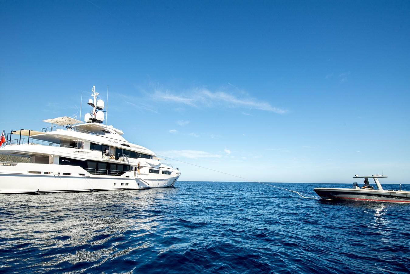 a couple of boats in the water aboard AXIOS Yacht for Sale