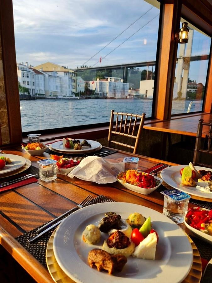 a table with food on it aboard SINAN BEY Yacht for Sale