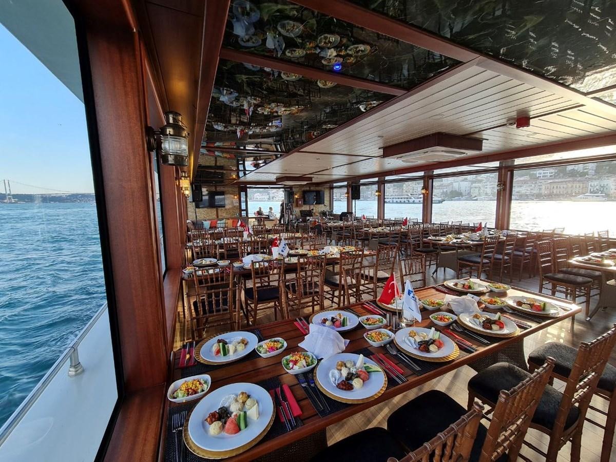 a table set for a meal on a boat aboard SINAN BEY Yacht for Sale