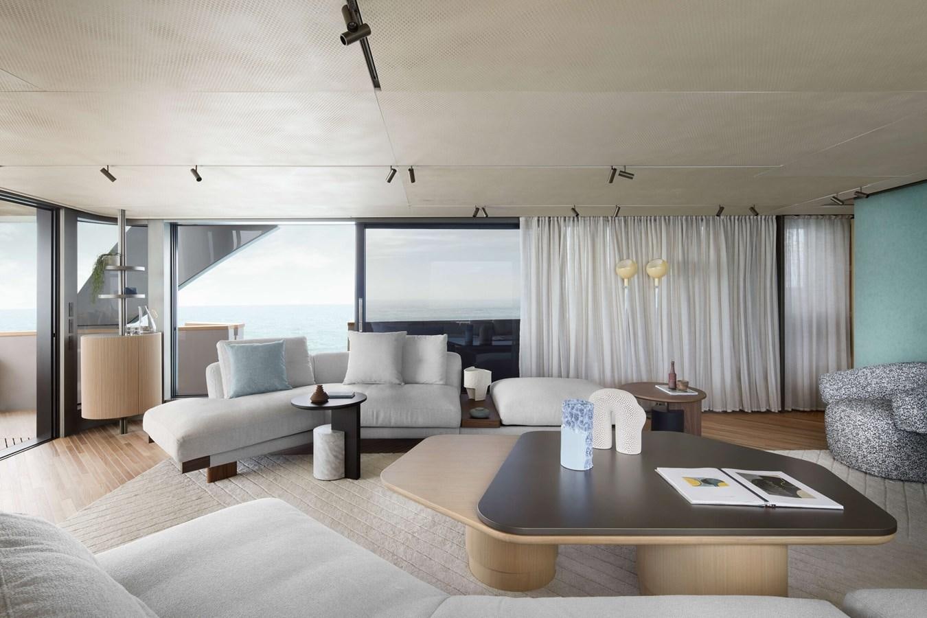 a living room with a large window aboard LA BREZZA Yacht for Sale