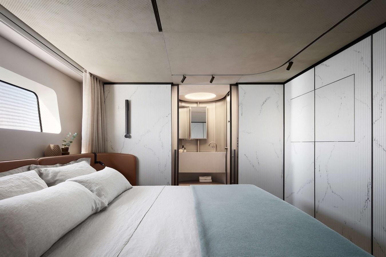 a bed in a room aboard LA BREZZA Yacht for Sale