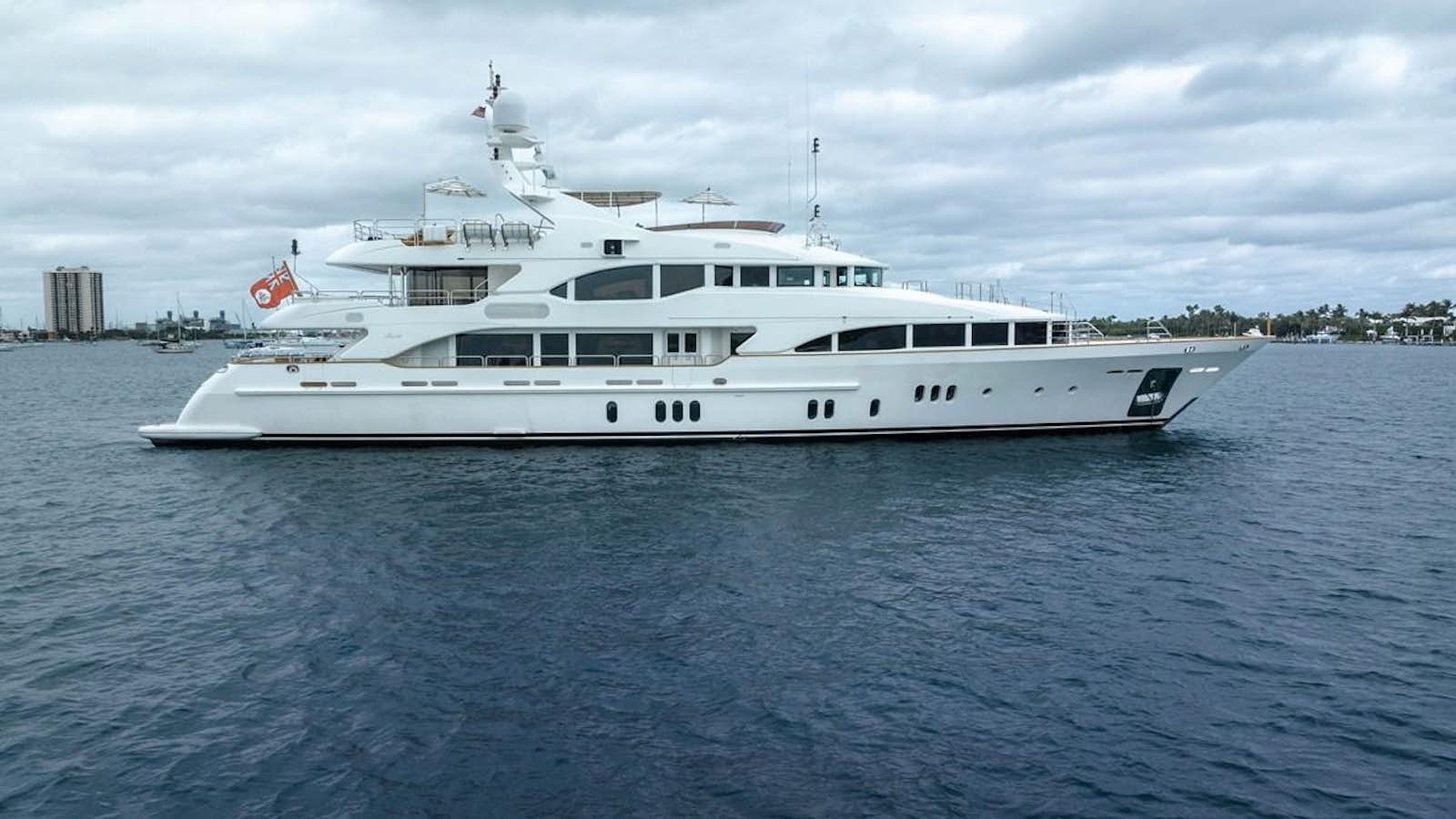 a white yacht on the water aboard ALEGRIA Yacht for Sale