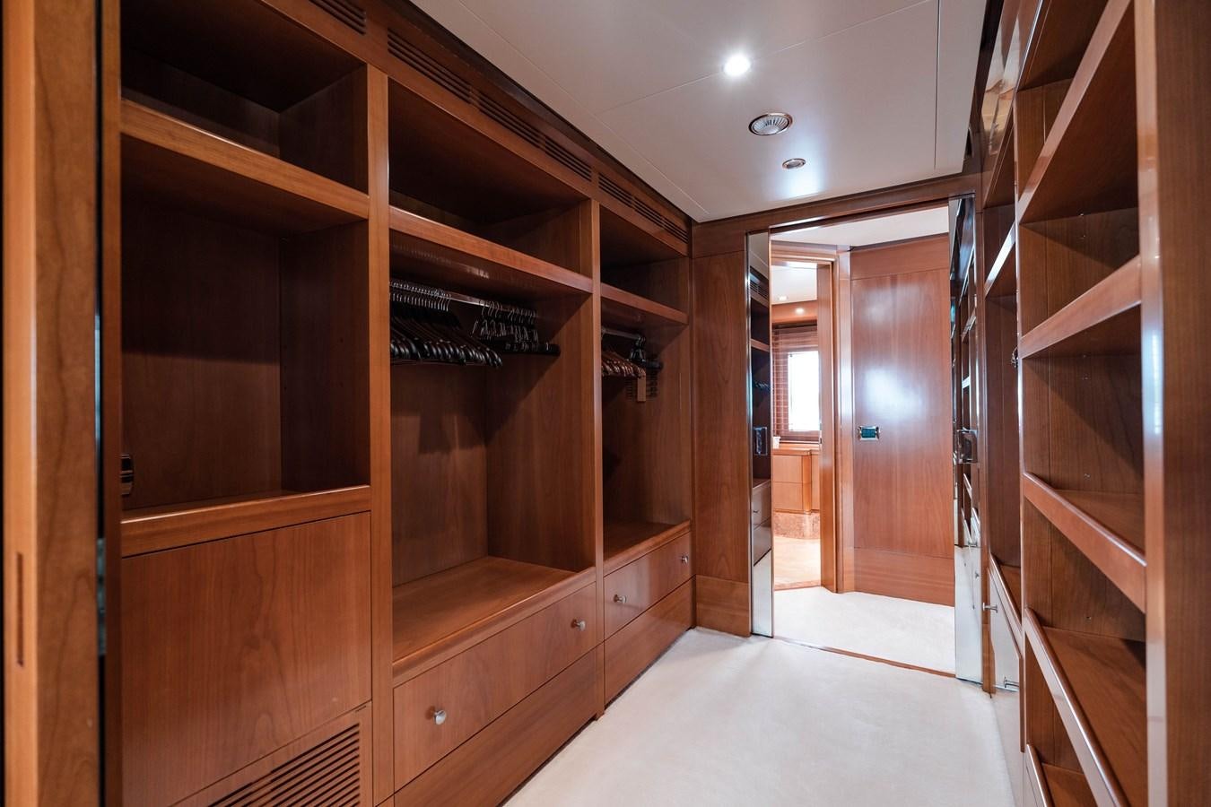 a room with a large closet aboard ALEGRIA Yacht for Sale