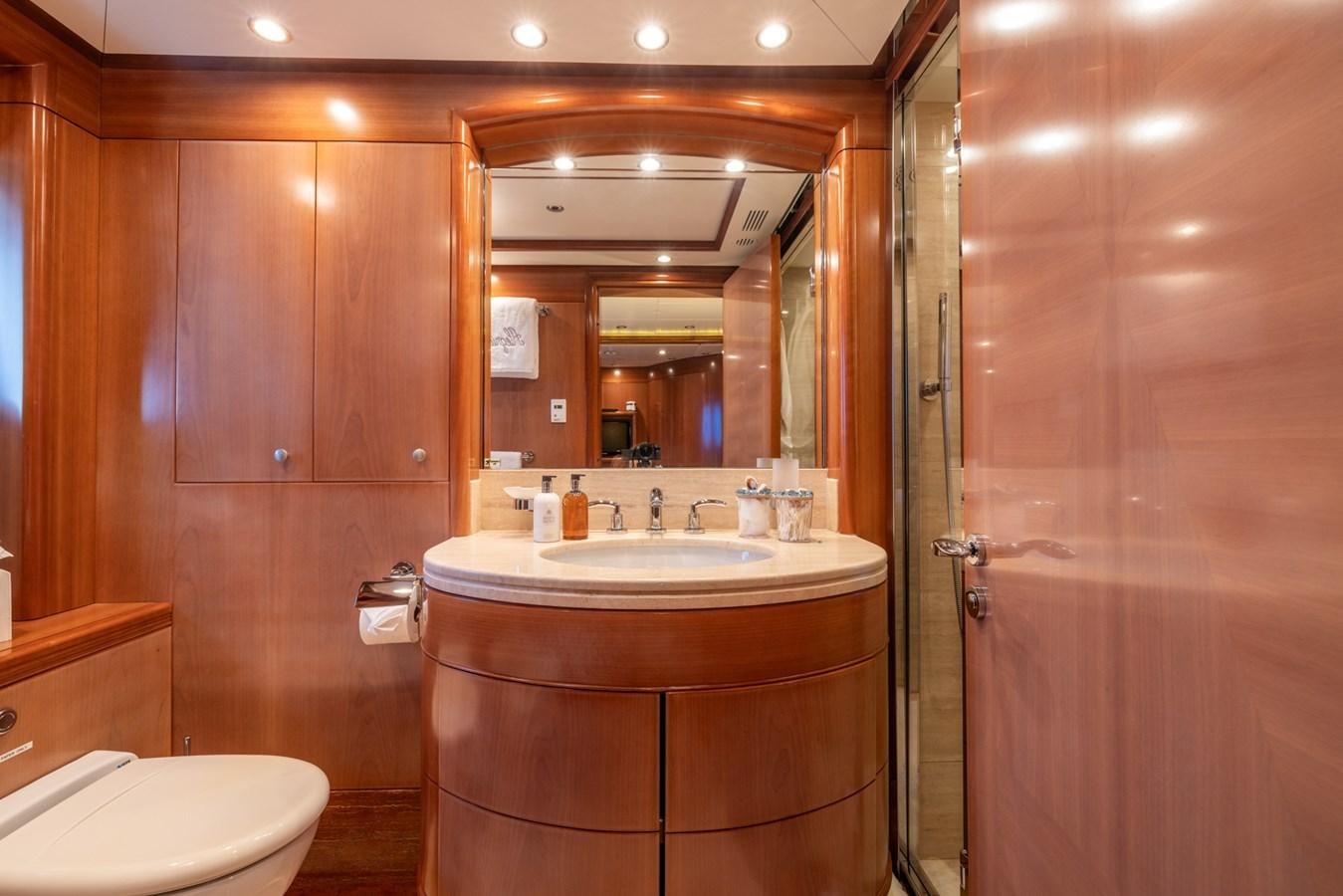 a bathroom with a sink and a mirror aboard ALEGRIA Yacht for Sale