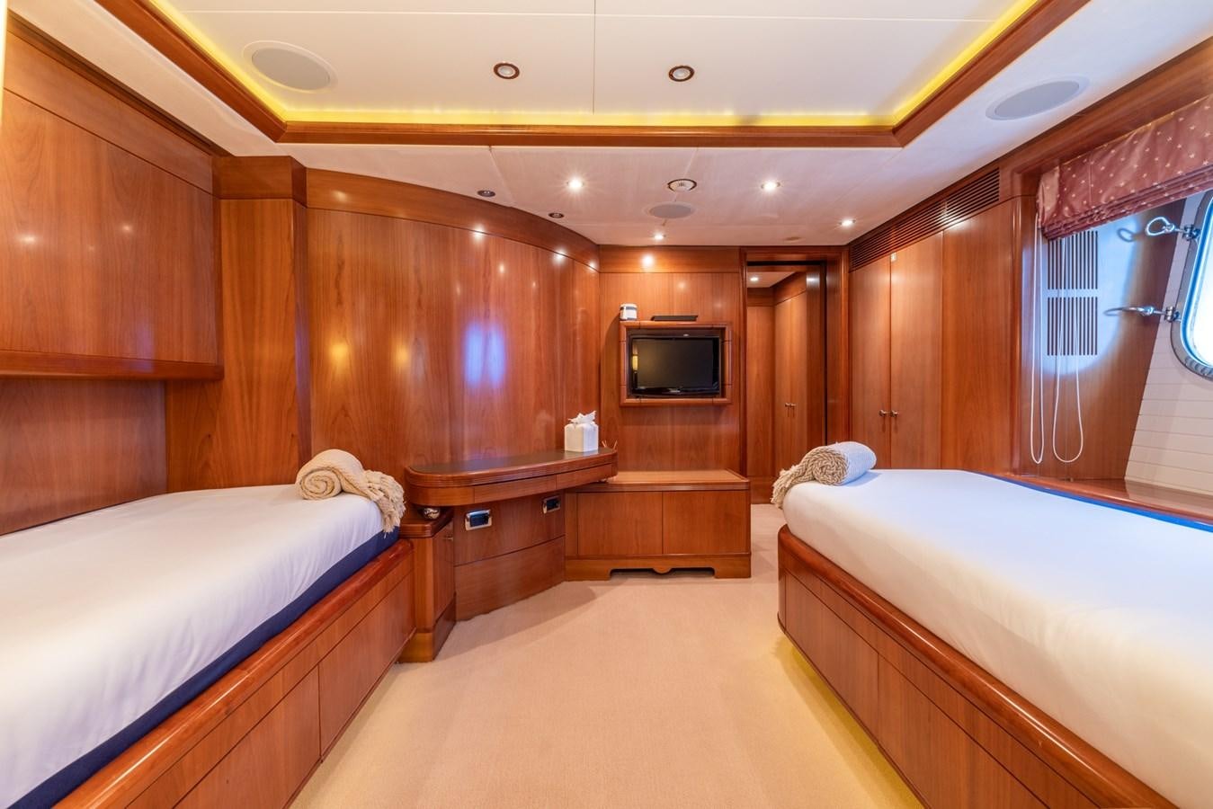 a room with two beds aboard ALEGRIA Yacht for Sale