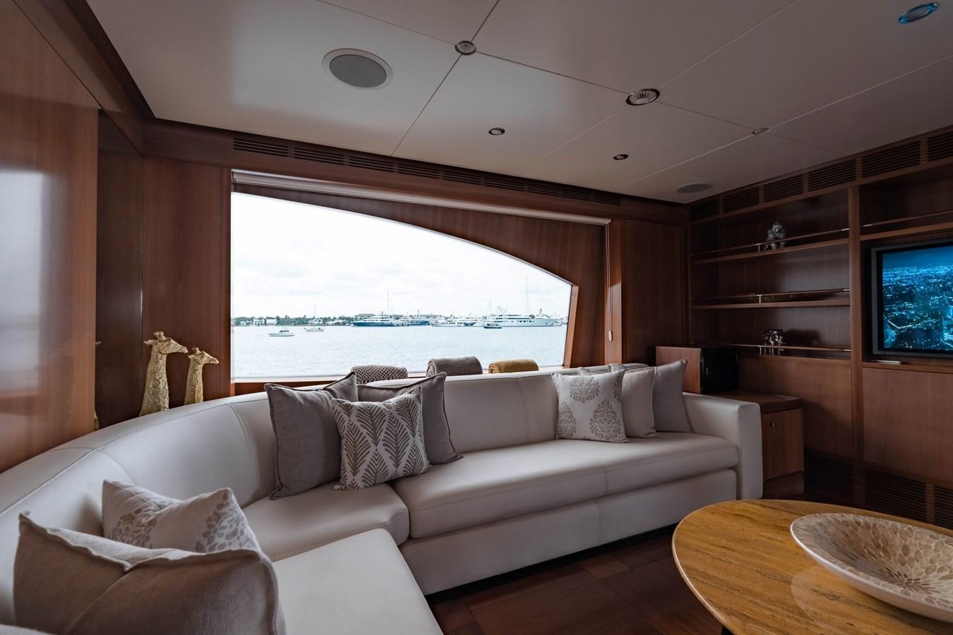 a living room with a large window aboard ALEGRIA Yacht for Sale