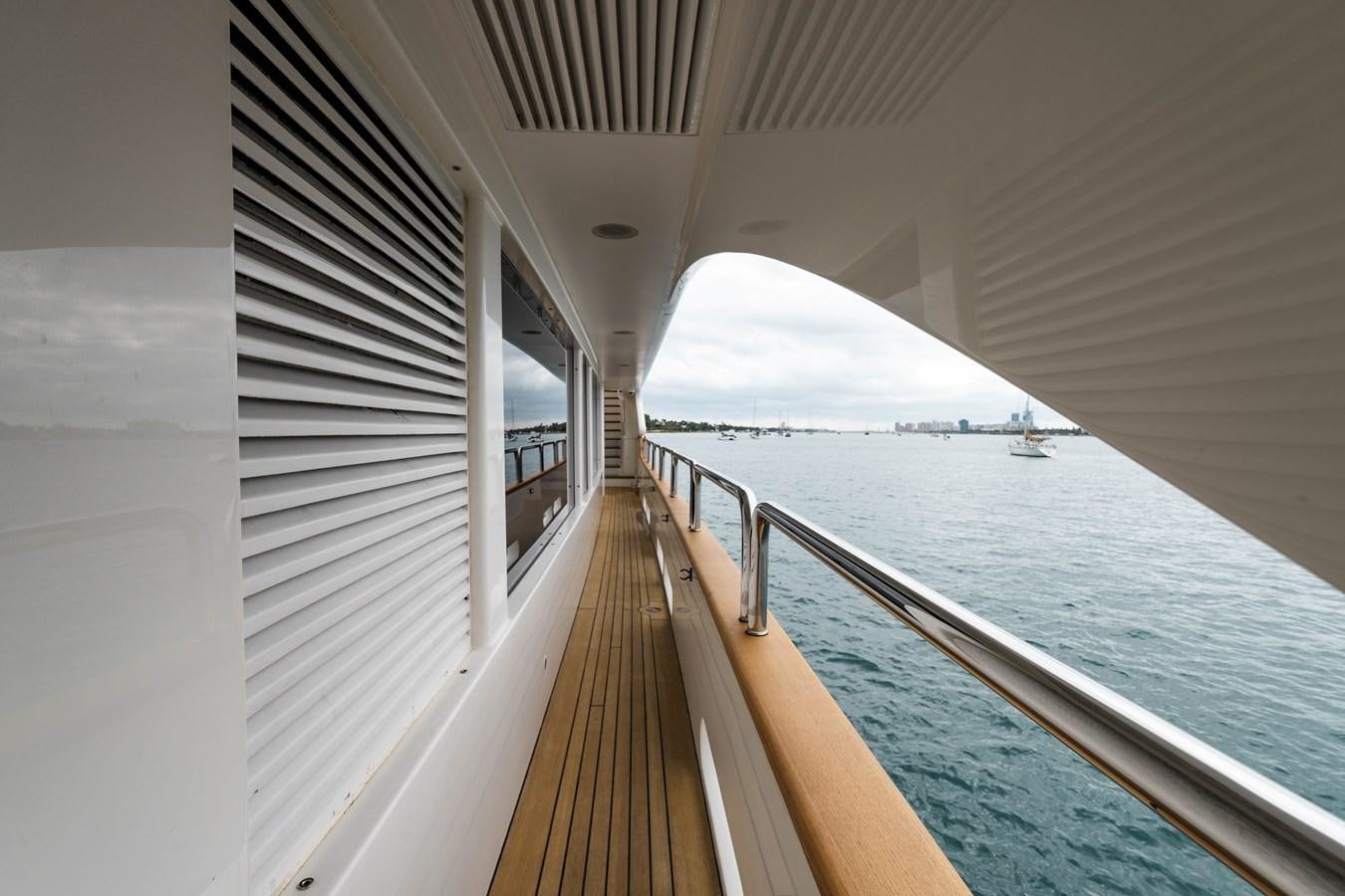 a long wooden bridge over water aboard ALEGRIA Yacht for Sale
