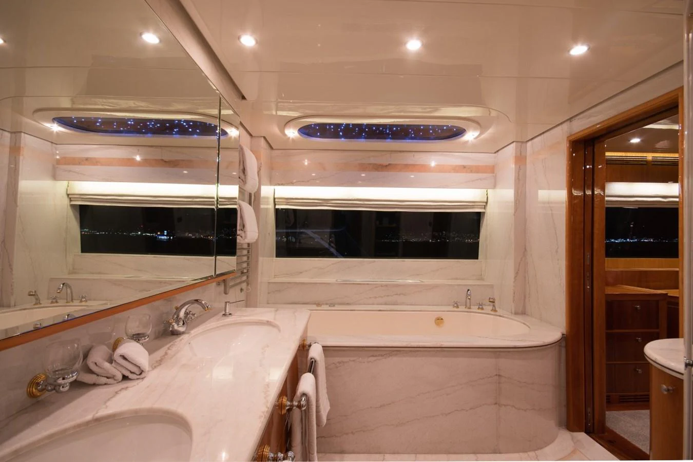a bathroom with a large tub aboard KOMOKWA Yacht for Charter