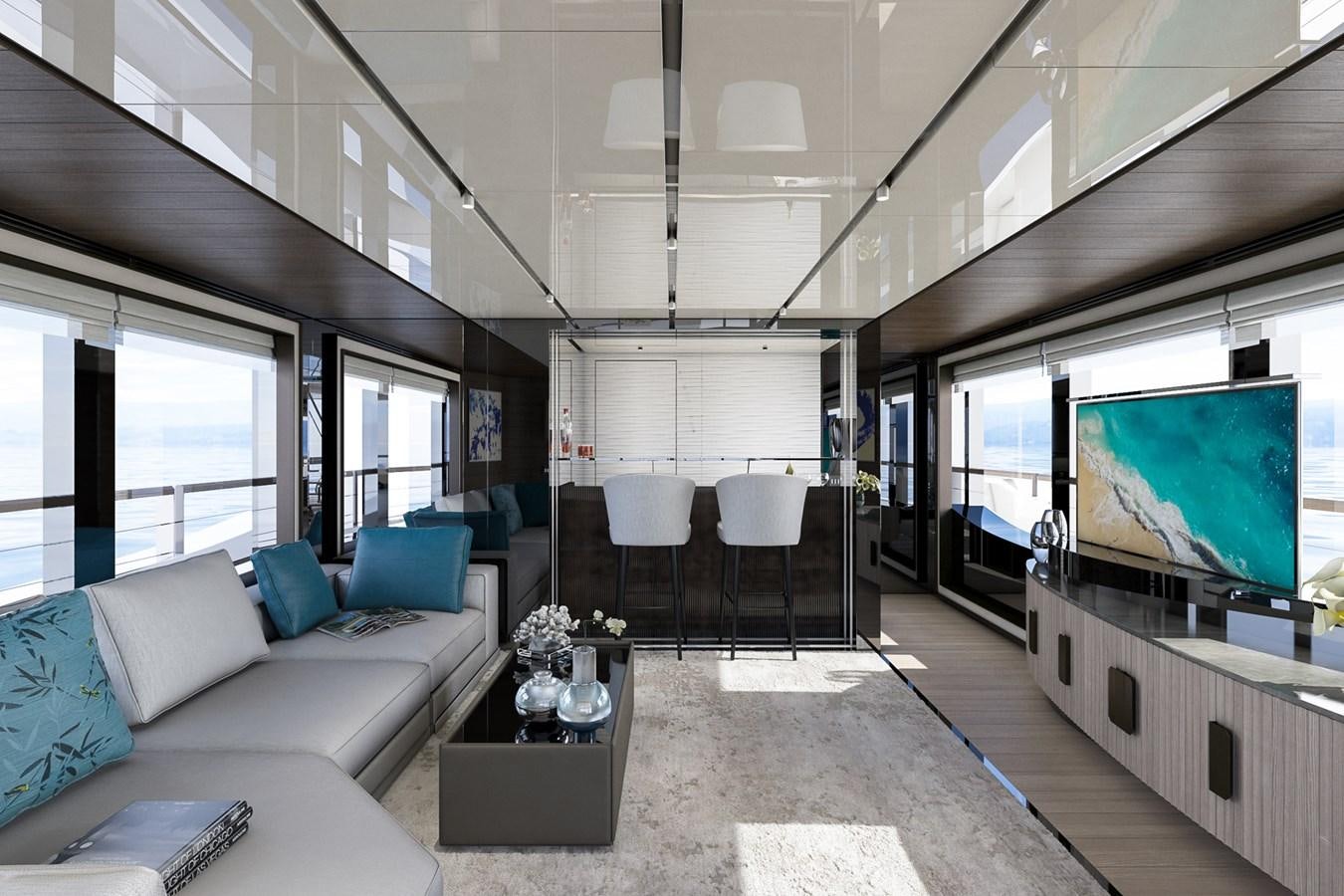 a living room with a large screen aboard AES NB 066 Yacht for Sale