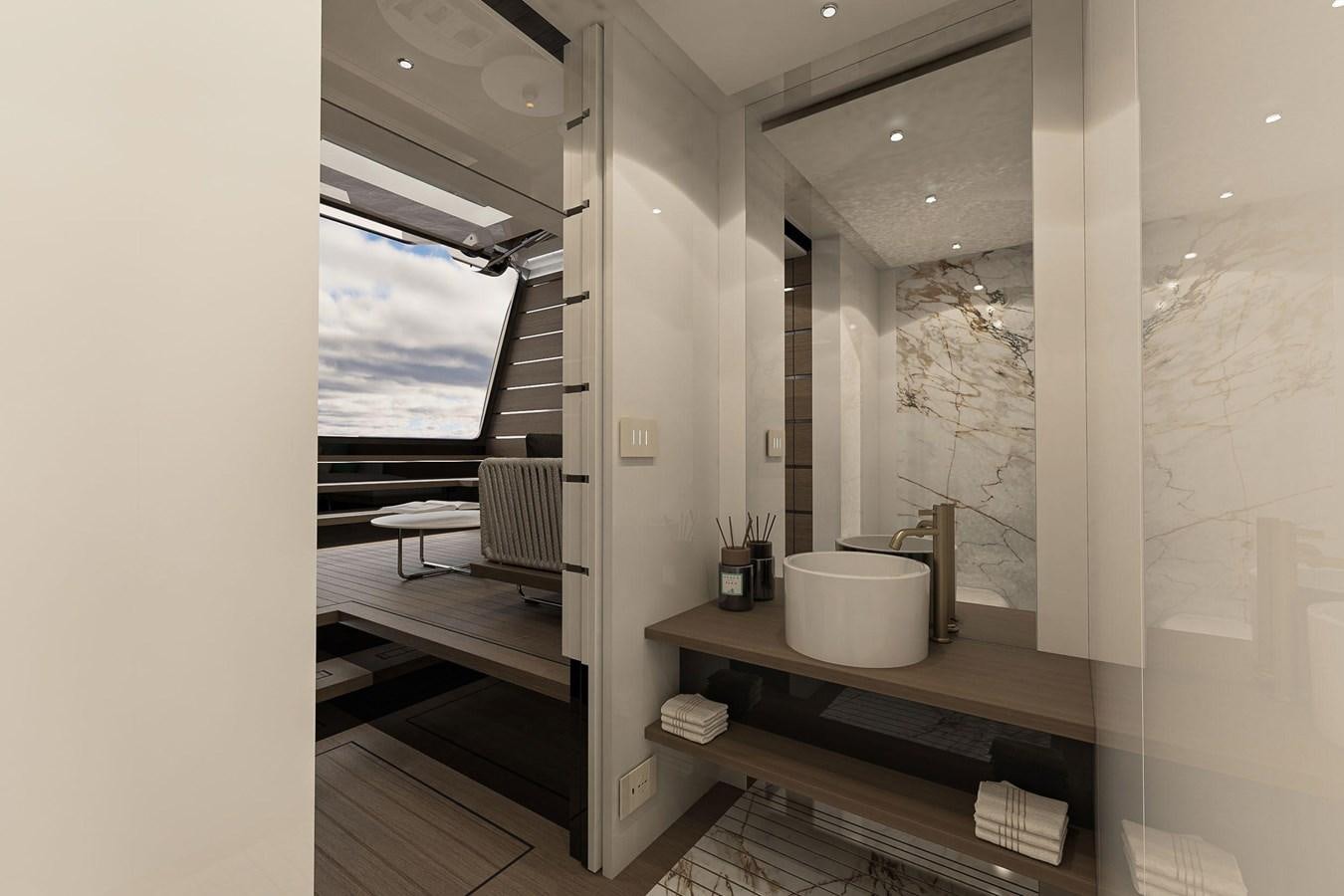 a bathroom with a large mirror aboard AES NB 066 Yacht for Sale