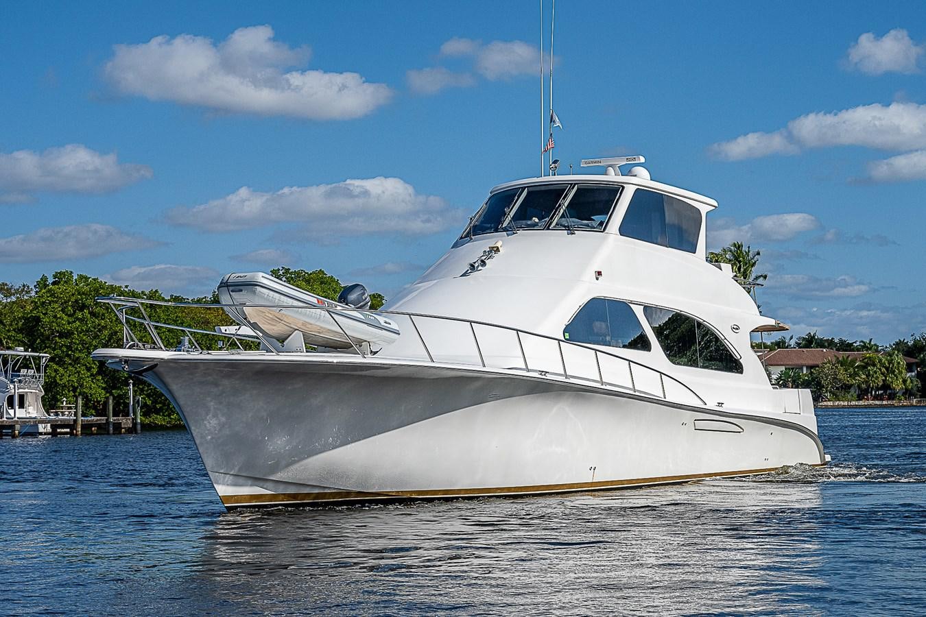 a white boat in the water aboard THIS LITTLE PIGGY Yacht for Sale